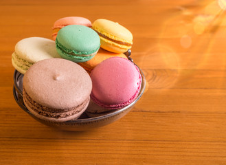 Tasty sweet macarons. Macaroons on old table.