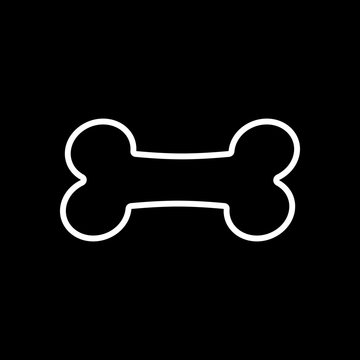 Dog bone icon. White icon on black background. Inversion