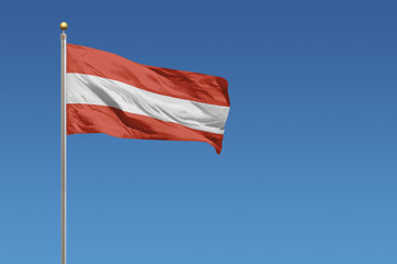 Austria flag on a clear blue sky day