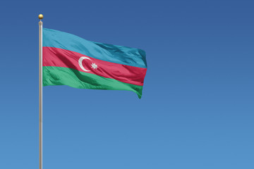 Naklejka na ściany i meble Azerbaijan flag on a clear blue sky day