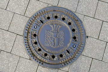 Decorative manhole / drain cover in Leipzeig City, Germany