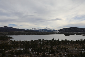 lake and frozen mountains cloudy day