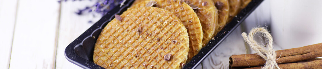 Horizontal panorama bakground of viennese wafers with caramel