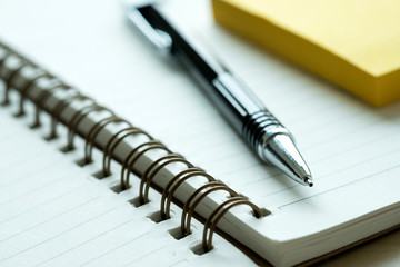 Top view of businessman  blank notebook business document black pen