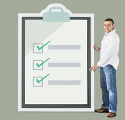 Fototapeta premium Man holding big clipboard mockup