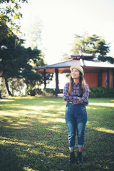 Farmer woman standing at farming land