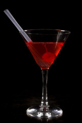 Cosmopolitan cocktail with cherry