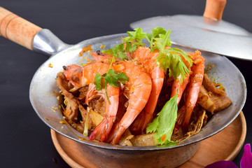 Baked shrimp with glass noodles in casserole
