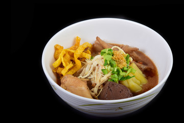 Thai chicken noodles soup with bitter gourd