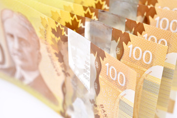 One hundred canadian banknotes (CAD) background