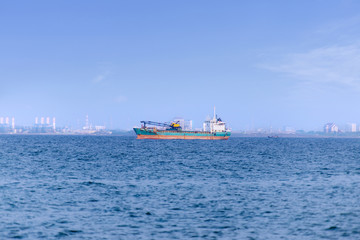 Fototapeta premium Shipping boat berthing at industrial port