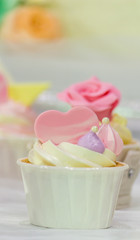 Sweet wedding cupcakes./ Sweet beauty and topping pastel color on wedding cake decoration.