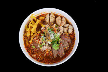 Thai spicy pork noodle (tom yum) with fried wontons