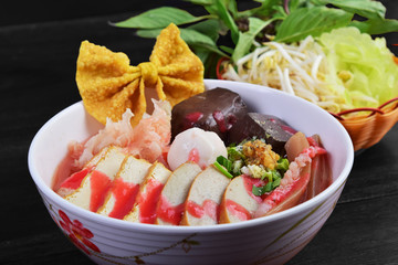 Yentafo, Red Sauce Noodle Soup, Thailand Street Food isolated on black background