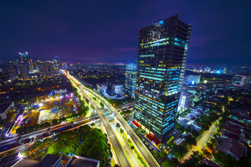 Fototapeta premium Beautiful night lights glowing on skyscrapers