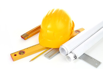 yellow helmet and plans