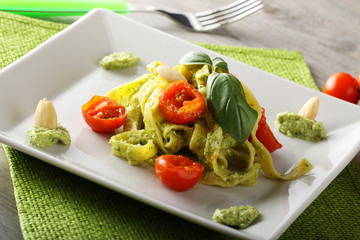 Pasta with zucchini pesto and cherry tomatoes