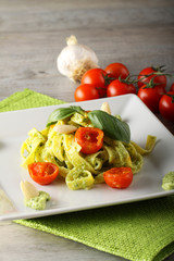 Pasta with zucchini pesto and cherry tomatoes