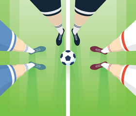 Soccer / Football Field With Players Foots In Boots. Referee With Two Players Top View. Long Perspective.