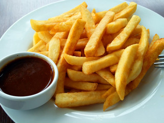 French fries on plate with the sauce