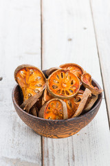 Dry Bael fruit - Slices of dry Bael fruit on the wooden table
