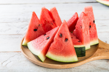 Watermelon on wooden table background