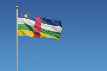 Flag of Central African Republic in front of a clear blue sky