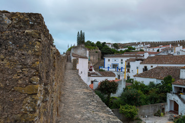 Fototapeta na wymiar Medieval Castle and Walls in Obidos Village in Portugal