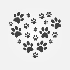 Heart with icons of dog paw prints vector illustration © tentacula