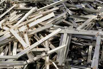 heap of scrap metal. Spent aluminum profiles