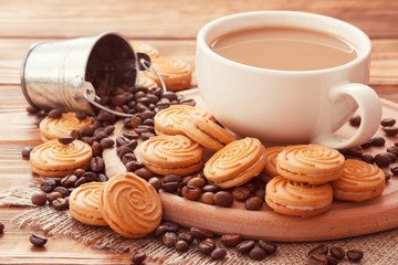 Slow provincial morning coffee and milk drink with cookies and coffee beans