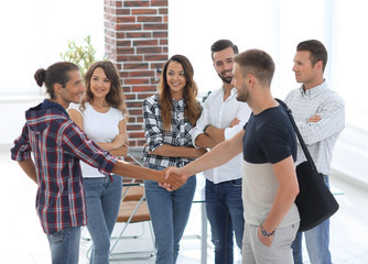 handshake Manager and customer in the office.