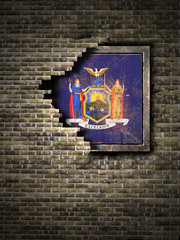 Old New York flag in brick wall