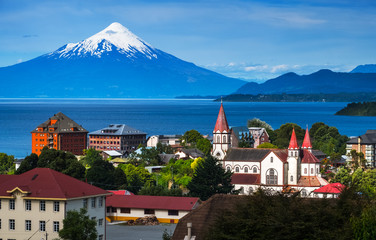 City of Puerto Varas with volcano of Osorno on the background. Chile - obrazy, fototapety, plakaty