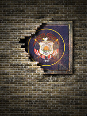 Old Utah flag in brick wall