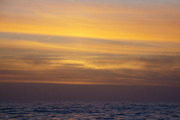 Naklejka na ściany i meble Livingston Island Antarctica, golden sunset over water