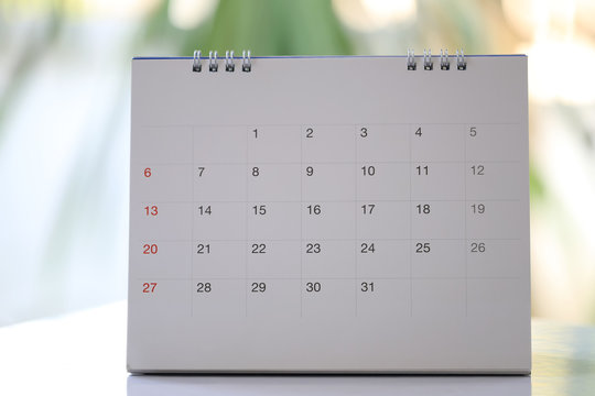 Calendar is placed on the desk.