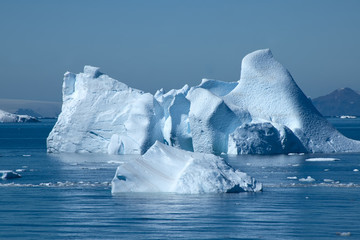 Browns Bluff Antarctica, iceberg with coastline in background