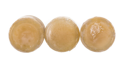 frozen bottled beer on white background