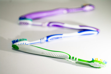 toothbrushes on white background
