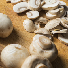 mushrooms mushrooms sliced on the Board cooking