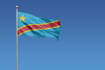 Democratic Republic of the Congo Flag in front of a clear blue sky