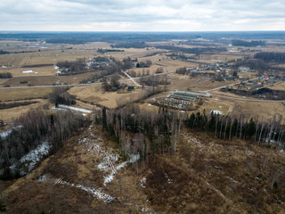 drone image. aerial view of rural area with houses and road network. populated area Dubulti near Jekabpils, Latvia