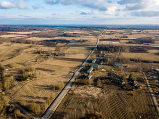 drone image. aerial view of rural area with houses and road network. populated area Dubulti near Jekabpils, Latvia