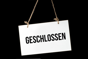 Ein Schild mit dem Aufdruck Geschlossen