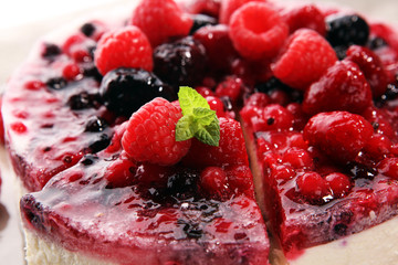 raspberry cake and many fresh raspberries
