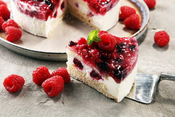 raspberry cake and many fresh raspberries