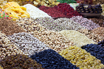Counter with nuts and dried fruits on the market.