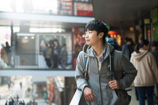Young man traveling in Korea, Seoul Street