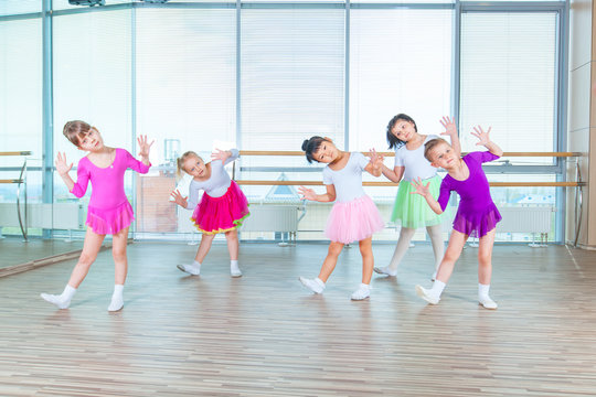 Children dancing in choreography class. happy children dancing on in hall, healthy life, kid's togethern dance kid class